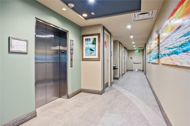 257 Auburn Ave, Kissimmee, FL 34747 - hall featuring elevator, recessed lighting, light colored carpet, and baseboards