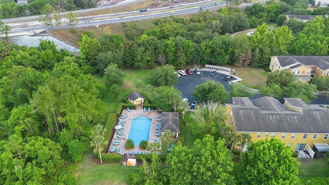 aerial view of property's location with a pool area