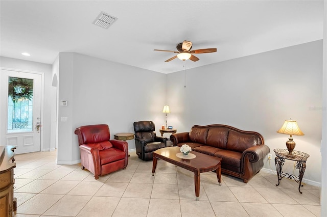 living room with a ceiling fan, light tile patterned floors, baseboards, and recessed lighting