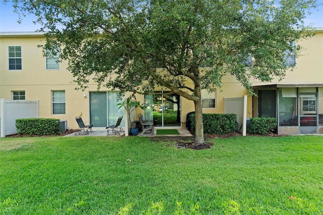 2829 Shady Willow Ln, Oviedo, FL 32765 - back of property with stucco siding and a sunroom