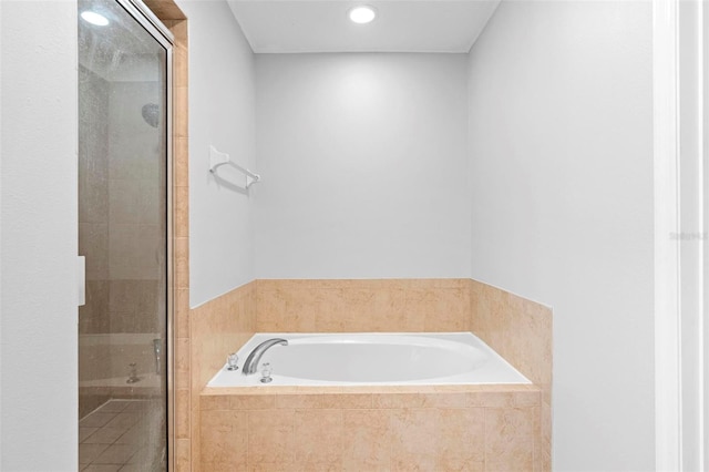 2829 Shady Willow Ln, Oviedo, FL 32765 - bathroom featuring a bath, a shower stall, and recessed lighting