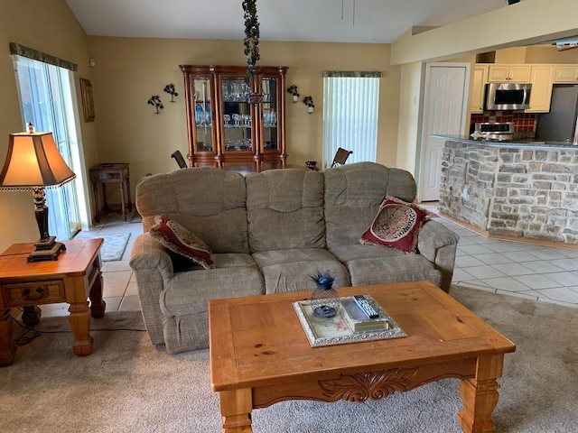 1585 Stefan Cole Ln, Apopka, FL 32703 - living area featuring light colored carpet and light tile patterned floors