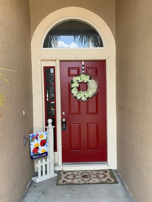 1585 Stefan Cole Ln, Apopka, FL 32703 - doorway to property with stucco siding