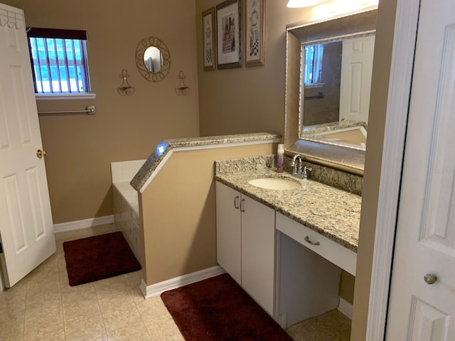 1585 Stefan Cole Ln, Apopka, FL 32703 - bathroom featuring tile patterned floors, vanity, and baseboards