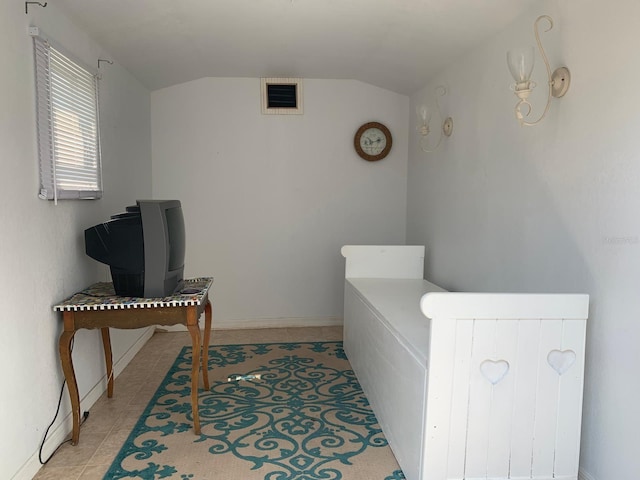1585 Stefan Cole Ln, Apopka, FL 32703 - bathroom with lofted ceiling and baseboards