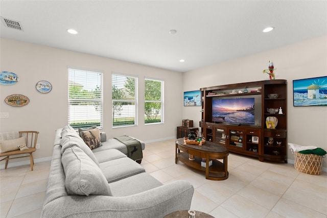 488 Kistler Cir, Clermont, FL 34715 - living area featuring light tile patterned flooring, baseboards, and recessed lighting