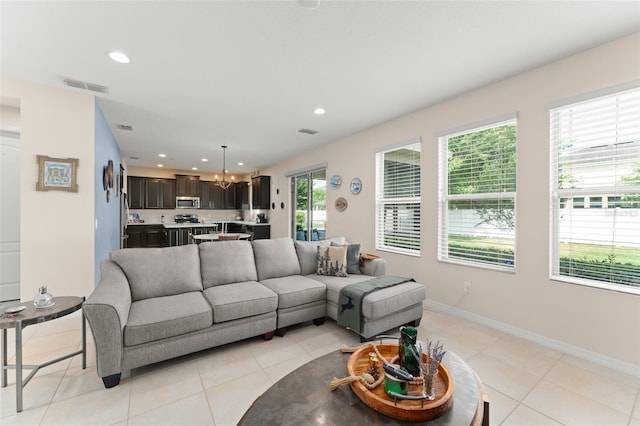 488 Kistler Cir, Clermont, FL 34715 - living room featuring light tile patterned flooring, recessed lighting, and baseboards