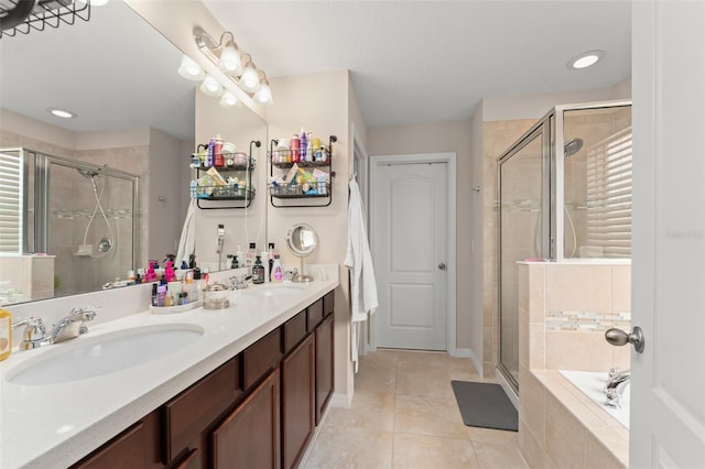 488 Kistler Cir, Clermont, FL 34715 - full bathroom with a stall shower, tile patterned flooring, a garden tub, and double vanity