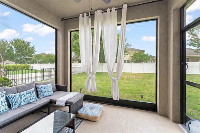 488 Kistler Cir, Clermont, FL 34715 - sunroom / solarium with a ceiling fan and an outdoor living space