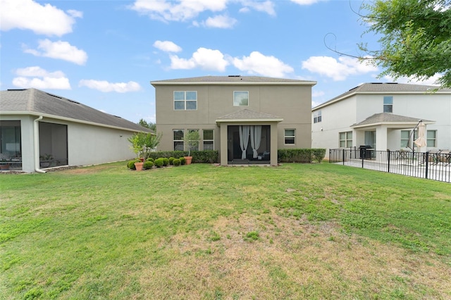 488 Kistler Cir, Clermont, FL 34715 - rear view of house with a sunroom and stucco siding