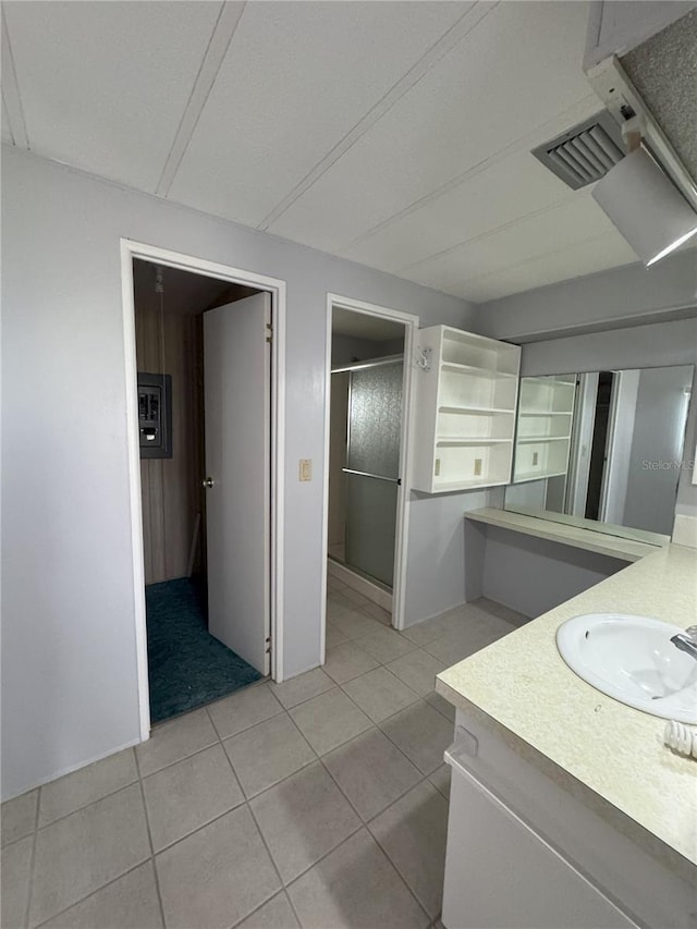 2116 Wax Myrtle Dr Unit Ge, Zellwood, FL 32798 - full bath featuring a stall shower, tile patterned floors, and vanity