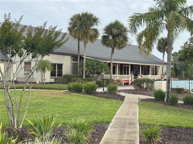 2116 Wax Myrtle Dr Unit Ge, Zellwood, FL 32798 - view of front of property featuring an outdoor pool and covered porch
