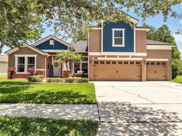 3380 Pawleys Loop N, Saint Cloud, FL 34769 - view of front facade with a front lawn, concrete driveway, stucco siding, an attached garage, and stone siding