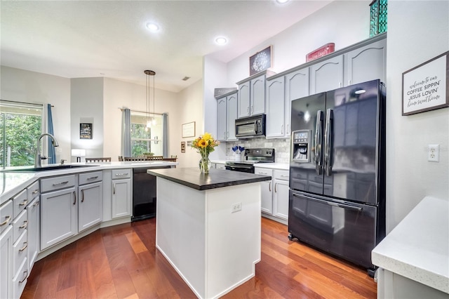 3380 Pawleys Loop N, Saint Cloud, FL 34769 - kitchen featuring black fridge, stainless steel electric range, dishwasher, a sink, and recessed lighting