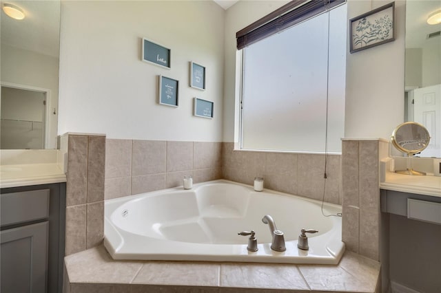 3380 Pawleys Loop N, Saint Cloud, FL 34769 - bathroom with healthy amount of natural light, vanity, and a bath