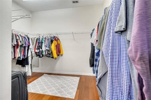 3380 Pawleys Loop N, Saint Cloud, FL 34769 - spacious closet featuring wood finished floors