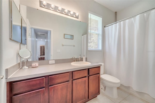 3380 Pawleys Loop N, Saint Cloud, FL 34769 - bathroom featuring tile patterned floors, toilet, vanity, and a shower with shower curtain