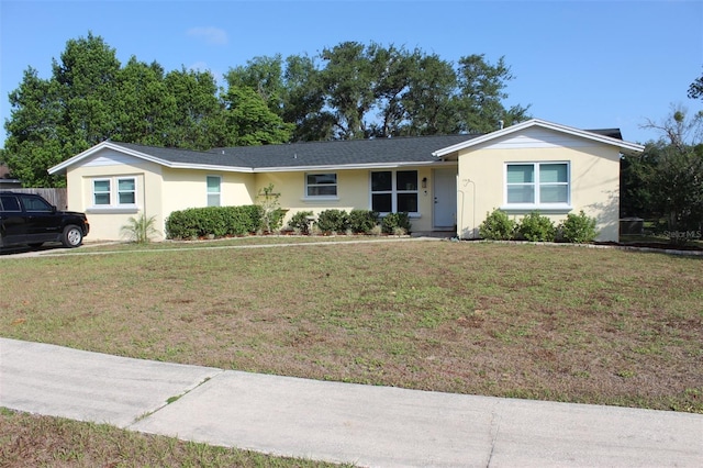 1364 Gainesville Dr, Deltona, FL 32725 - single story home featuring a front yard and stucco siding