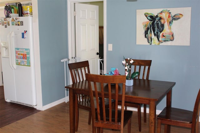 1364 Gainesville Dr, Deltona, FL 32725 - dining area with wood finished floors and baseboards