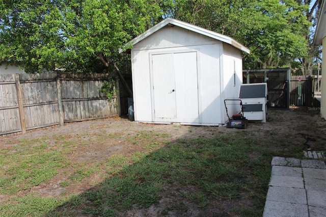 1364 Gainesville Dr, Deltona, FL 32725 - view of shed featuring a fenced backyard