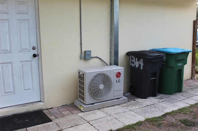 1364 Gainesville Dr, Deltona, FL 32725 - exterior view of stucco siding and ac unit
