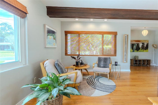 2001 Lily Ct, Sanford, FL 32771 - sitting room featuring plenty of natural light, beamed ceiling, wood finished floors, baseboards, and recessed lighting