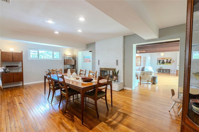 2001 Lily Ct, Sanford, FL 32771 - dining space with light wood finished floors, a fireplace, baseboards, and recessed lighting