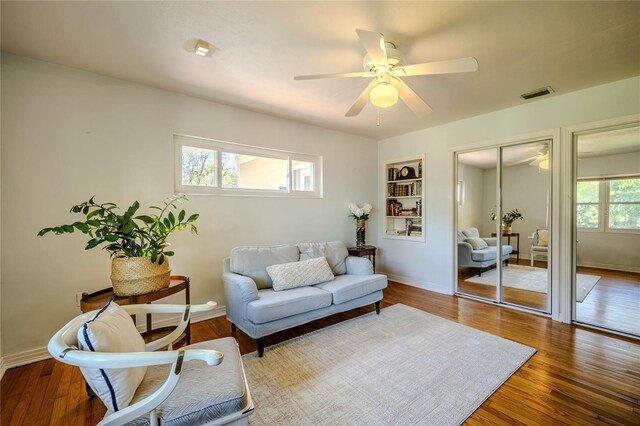 2001 Lily Ct, Sanford, FL 32771 - living room with ceiling fan, wood finished floors, and baseboards