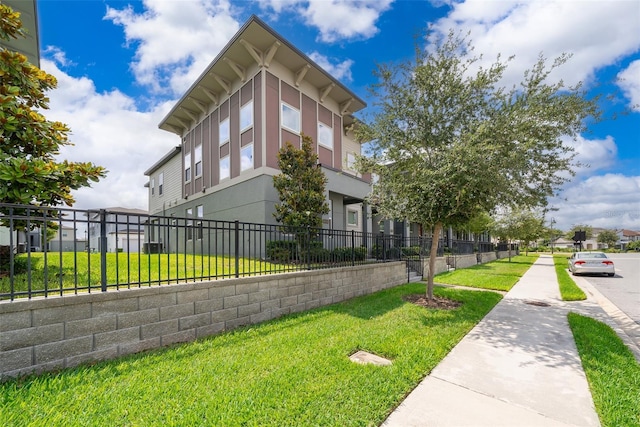 6132 Bimini Twist Loop, Orlando, FL 32819 - view of home's exterior featuring stucco siding