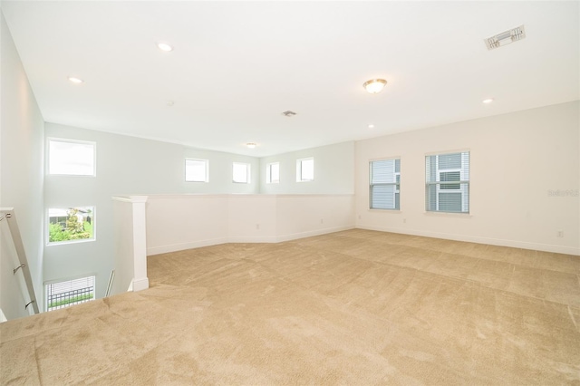 6132 Bimini Twist Loop, Orlando, FL 32819 - unfurnished room with light carpet, baseboards, and recessed lighting
