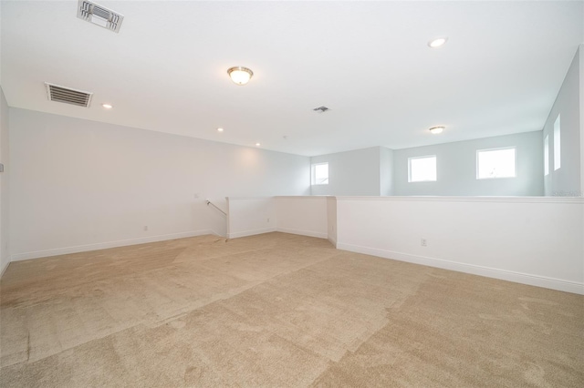 6132 Bimini Twist Loop, Orlando, FL 32819 - basement with light carpet, baseboards, and recessed lighting