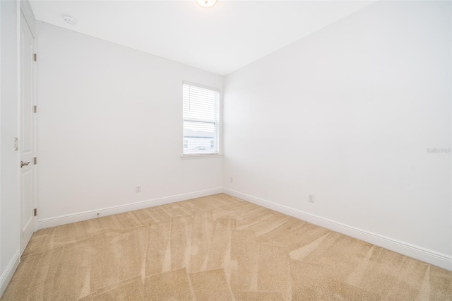 6132 Bimini Twist Loop, Orlando, FL 32819 - unfurnished room featuring light colored carpet, baseboards, and a smoke detector
