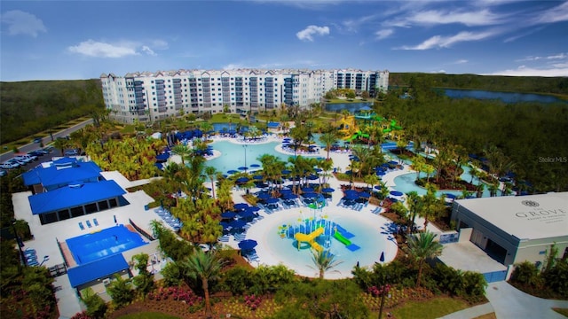 aerial view of apartment complex and a large body of water
