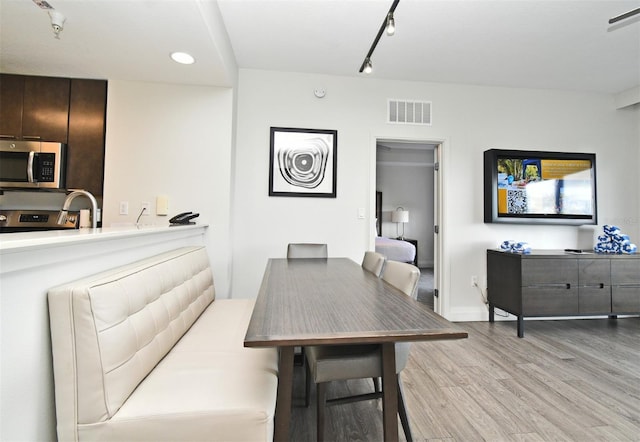 14501 Grove Resort Ave Unit 3741, Winter Garden, FL 34787 - dining space with light wood-style floors and recessed lighting