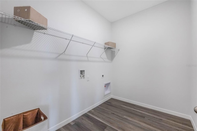 1974 Walnut Creek Dr, Kissimmee, FL 34744 - washroom with hookup for a washing machine, dark wood-style floors, hookup for an electric dryer, and baseboards