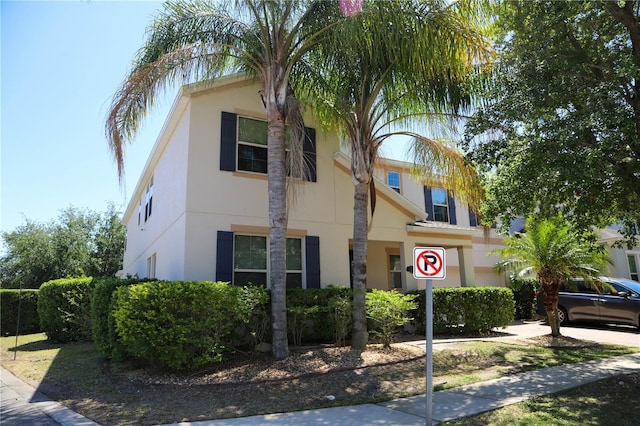 view of front of property featuring stucco siding