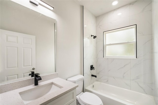 full bathroom featuring vanity, shower / tub combination, and toilet