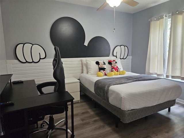 3193 Yellow Lantana Ln, Kissimmee, FL 34747 - bedroom with dark wood-style flooring, a desk, and ceiling fan