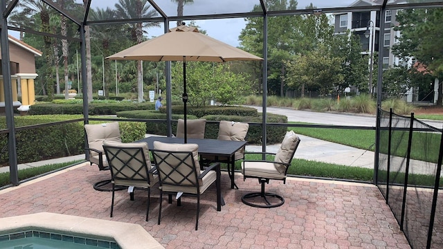 3193 Yellow Lantana Ln, Kissimmee, FL 34747 - view of patio / terrace featuring outdoor dining space and a lanai