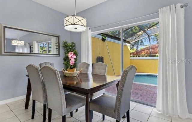 3193 Yellow Lantana Ln, Kissimmee, FL 34747 - tiled dining space featuring baseboards