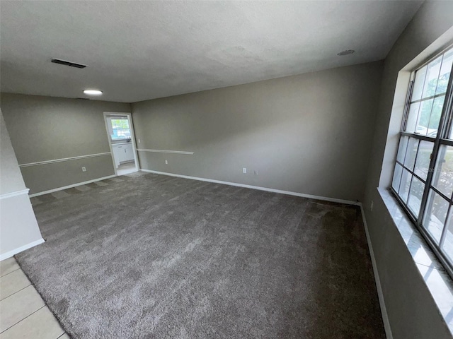 6624 Kristin Ct, Orlando, FL 32818 - empty room featuring baseboards and carpet