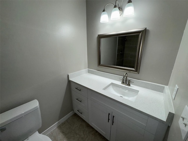 6624 Kristin Ct, Orlando, FL 32818 - bathroom featuring toilet, vanity, and baseboards