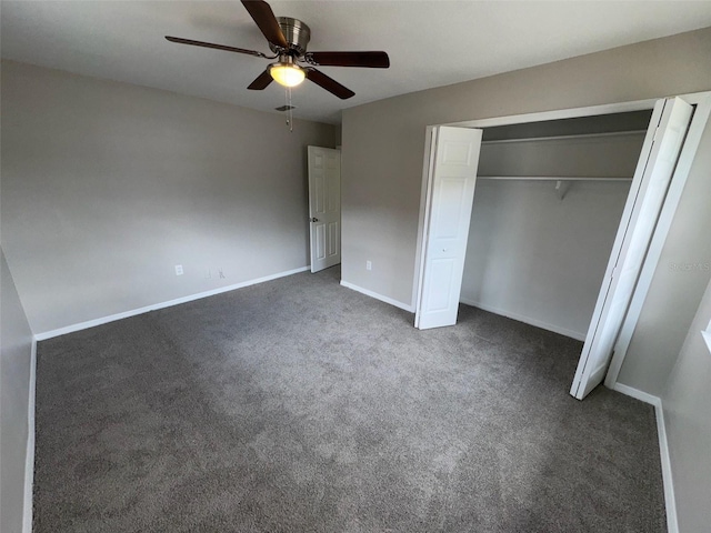 6624 Kristin Ct, Orlando, FL 32818 - unfurnished bedroom featuring dark carpet, a closet, baseboards, and ceiling fan