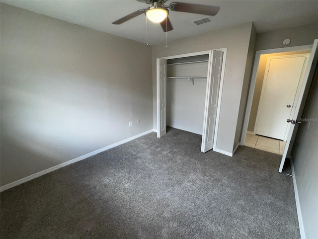 6624 Kristin Ct, Orlando, FL 32818 - unfurnished bedroom featuring carpet flooring, a closet, baseboards, and a ceiling fan