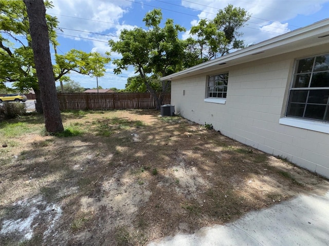6624 Kristin Ct, Orlando, FL 32818 - view of yard with fence and central air condition unit