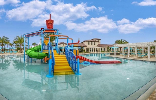 2030 Majorca Dr, Kissimmee, FL 34747 - communal playground featuring a water play area, a pergola, and a community pool