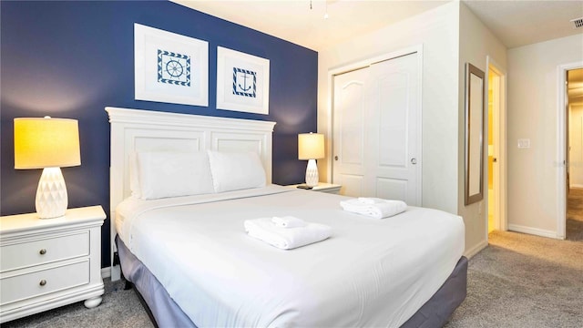 2030 Majorca Dr, Kissimmee, FL 34747 - bedroom with carpet floors, a closet, and baseboards