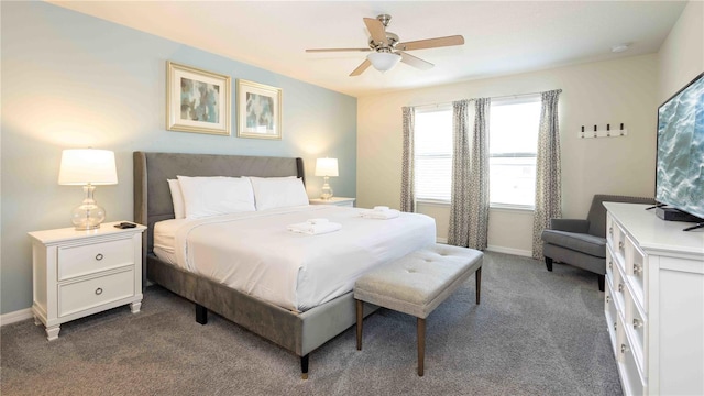 2030 Majorca Dr, Kissimmee, FL 34747 - bedroom with dark carpet, baseboards, and ceiling fan