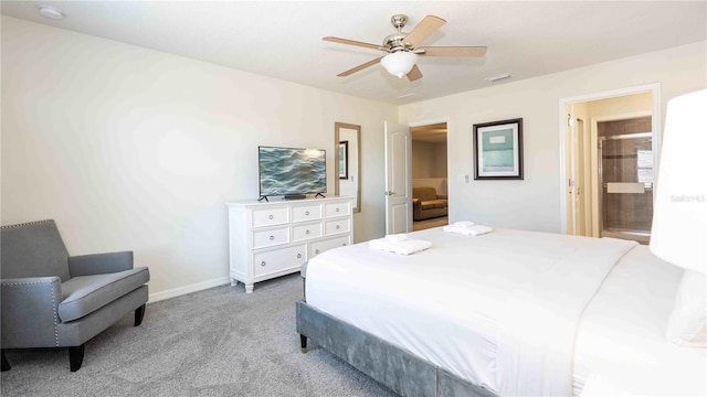 2030 Majorca Dr, Kissimmee, FL 34747 - carpeted bedroom featuring baseboards, ceiling fan, and connected bathroom