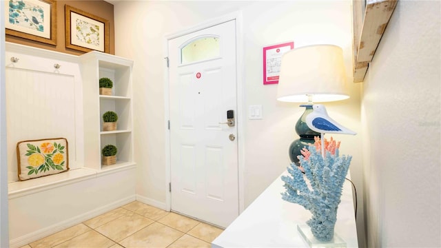 2030 Majorca Dr, Kissimmee, FL 34747 - foyer entrance featuring light tile patterned floors and baseboards
